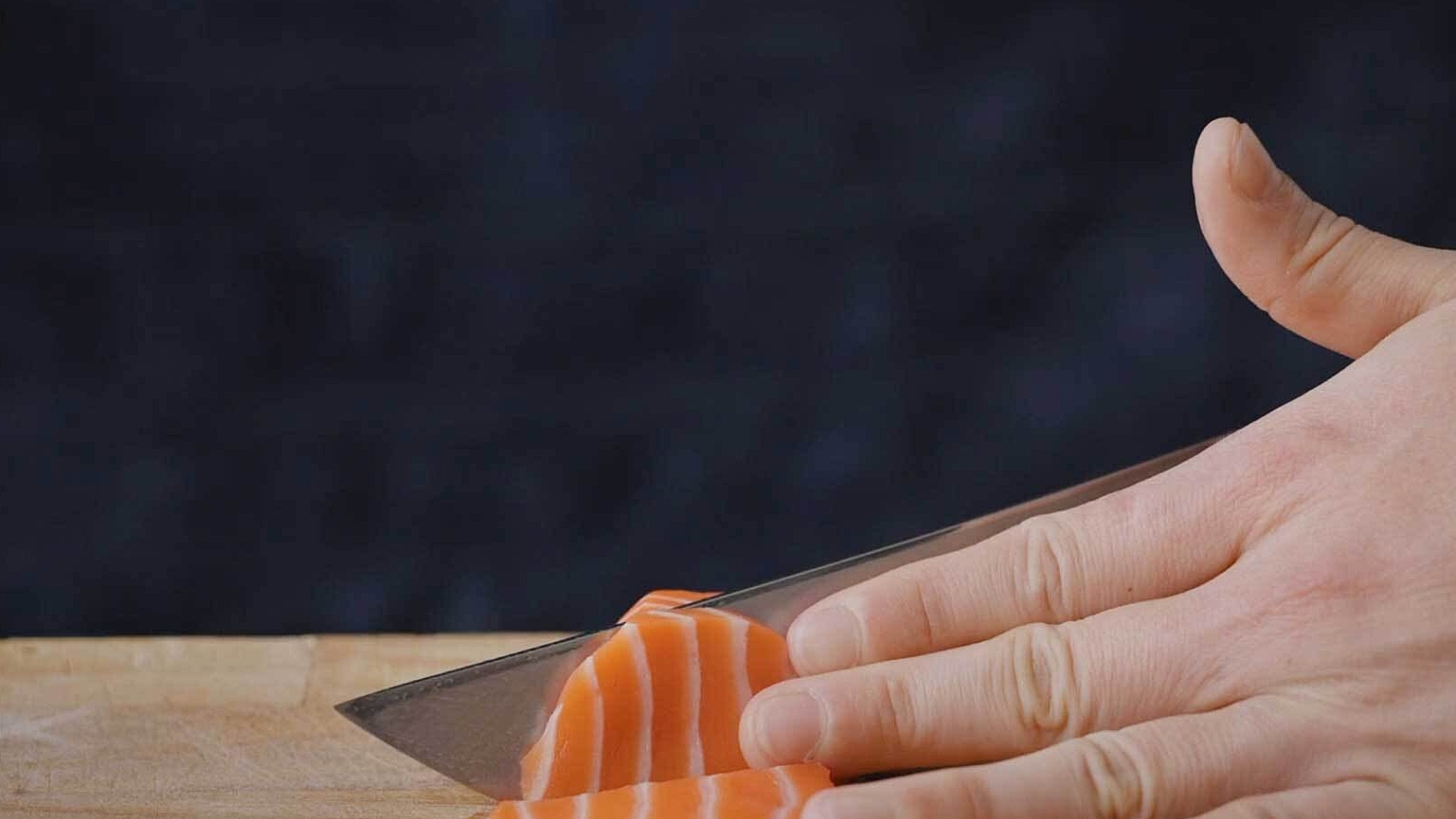 Slicing a salmon fillet
